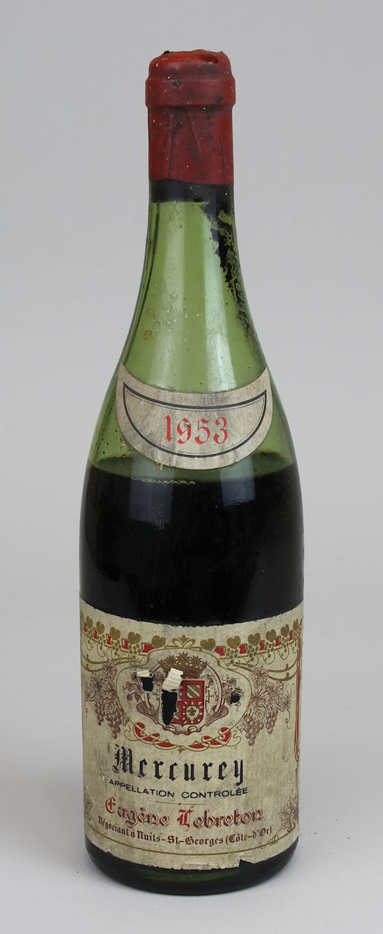 Eine Flasche 1953er Mercurey, Eugéne Lebreton, Nuits-St.-Georges, Etikett besch., Füllhöhe: unter