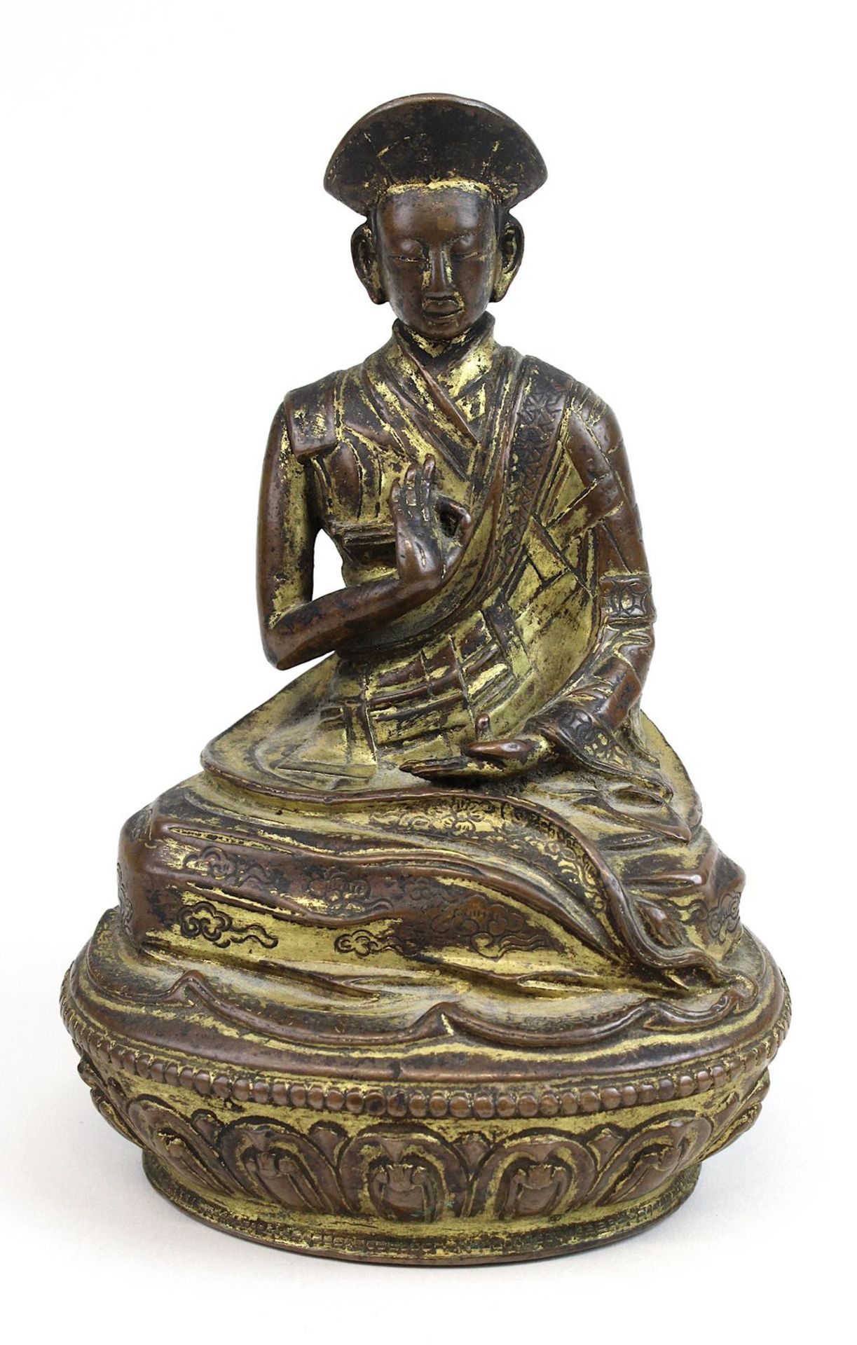 Lama aus Bronze, Himalaya 17 Jh., nach Vorbild eines Heiligen aus dem 11 Jh., Bronze mit Resten