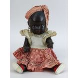 Petitcollin - Afrikanische Kleinkinderpuppe mit Kleidung aus Zelluloid, Frankreich 1930-1950, mit