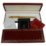 Must de Cartier, vergoldeter Kugelschreiber Trinity, in (wohl) 20 Micron Goldauflage, auf
