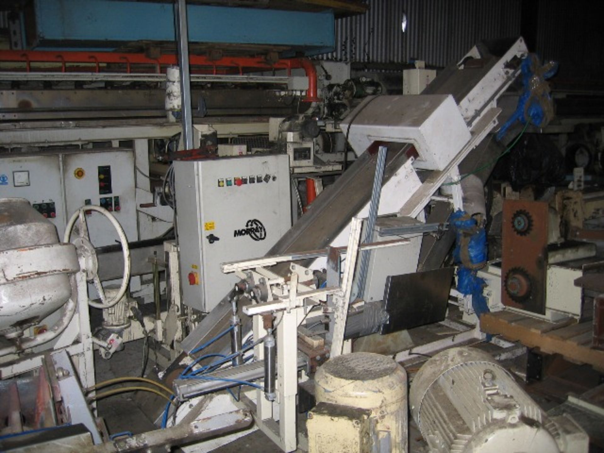 Packing Line - Morray Bagging Line, comprising a bag placer, birds beak bag clamp, bag aligner,