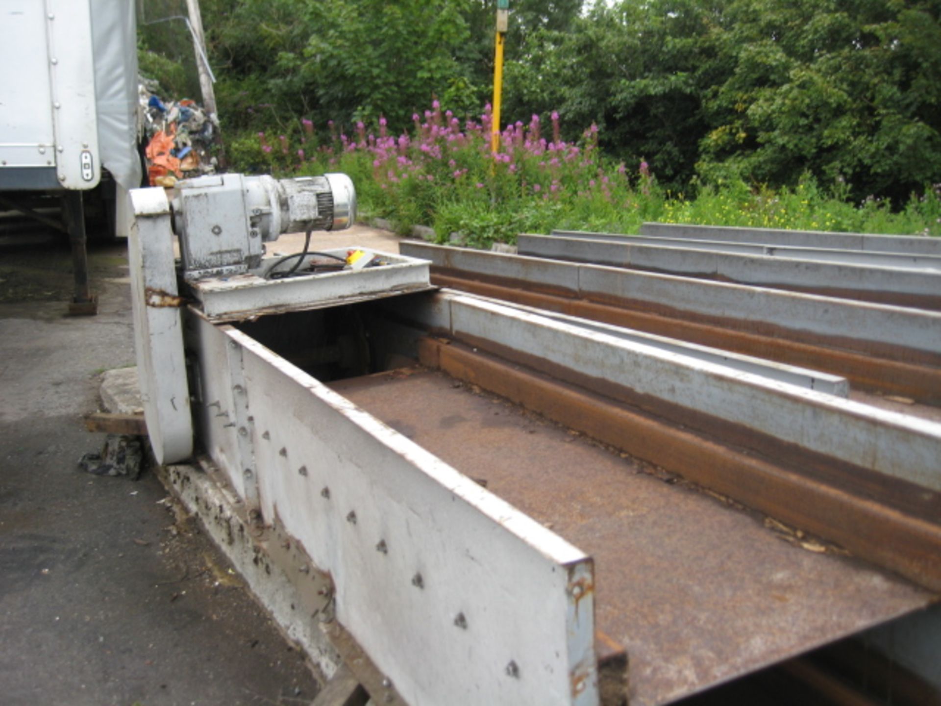 Shrouded Chain - Twin Chain Conveyor, 20 metres long with 100mm deep plastic flight extensions.