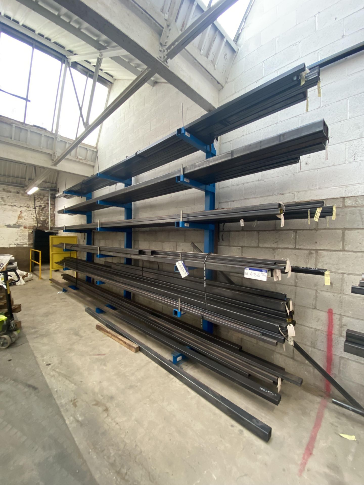 Six Tier Three Section Single Sided Stock Rack, currently 5m x approx. 900mm x 3.5m high (contents