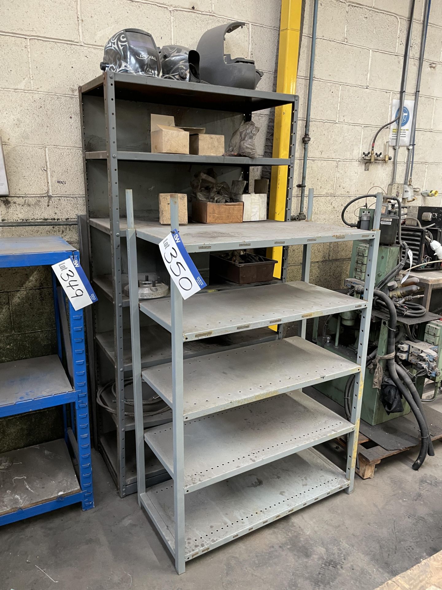 Two Multi-Tier Steel Stock Racks, with contents Please read the following important notes:- ***