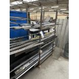 Three Steel Post Stillages, with assorted steel plates, angle, tube, box section and lengths