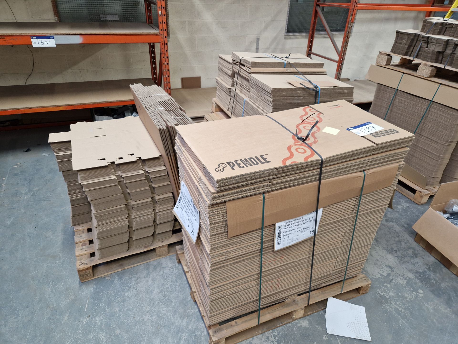 Three Pallets of Branded Flat Packed Cardboard Boxes and Dividers Please read the following