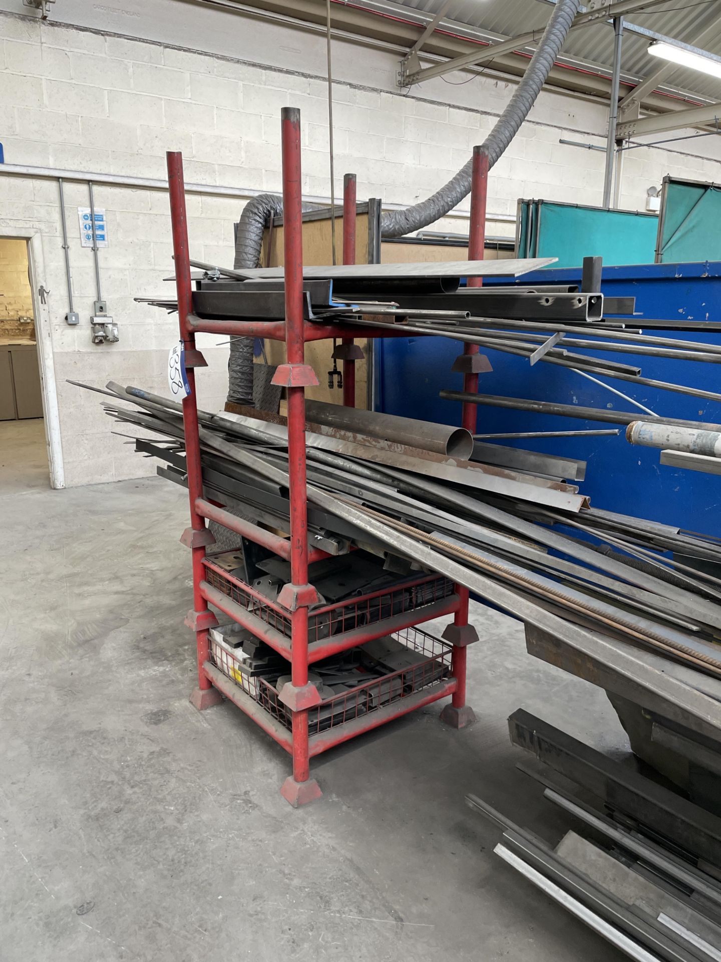 Four Steel Post Stillages, with assorted steel plates, angle, tube, box section and lengths Please