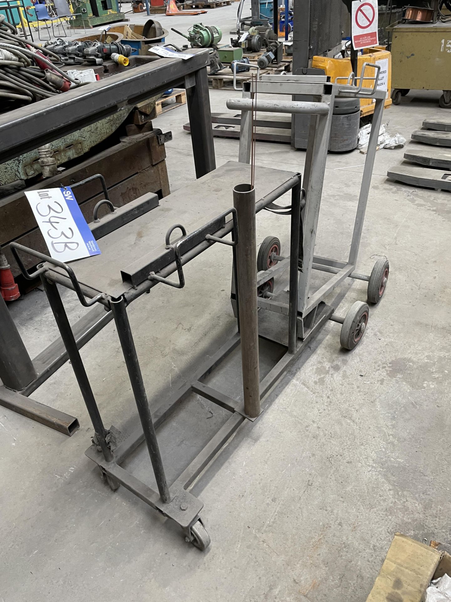 Two Steel Trolleys Please read the following important notes:- ***Overseas buyers - All lots are
