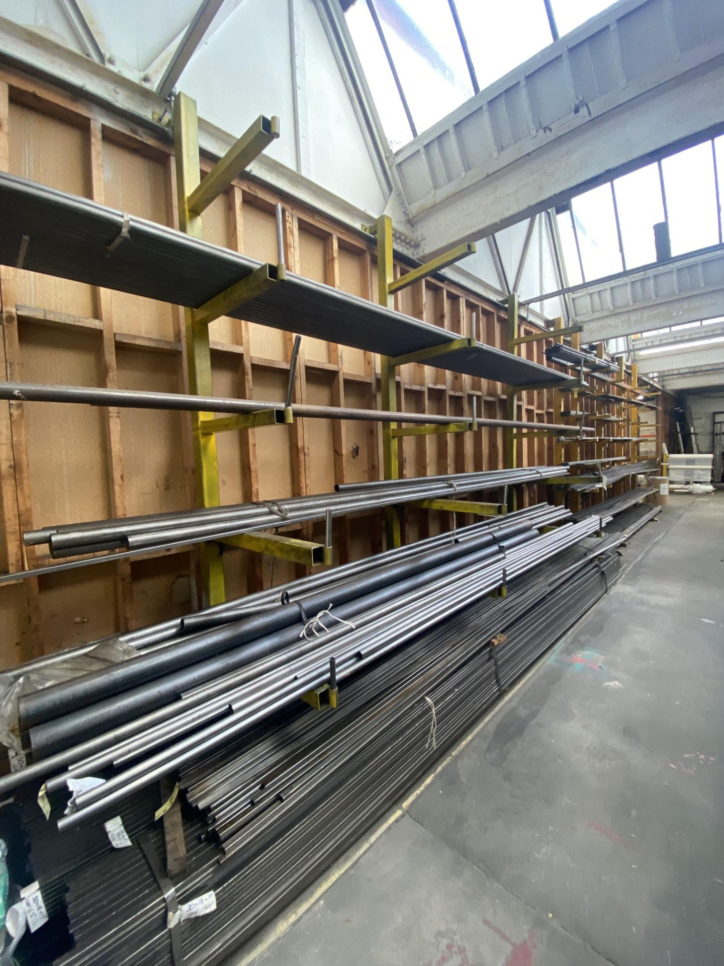 Five Tier Single Sided Three Section Stock Rack, approx. 4.4m long x 1.1m (contents excluded –