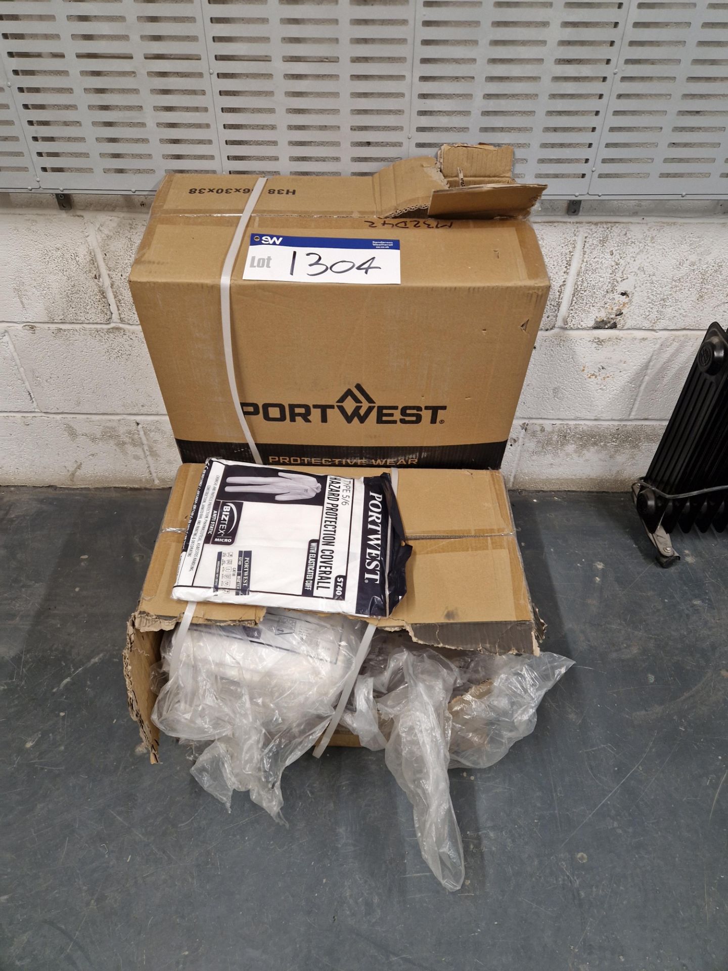 Three Boxes of Port West Protective Overalls Please read the following important notes:- ***Overseas