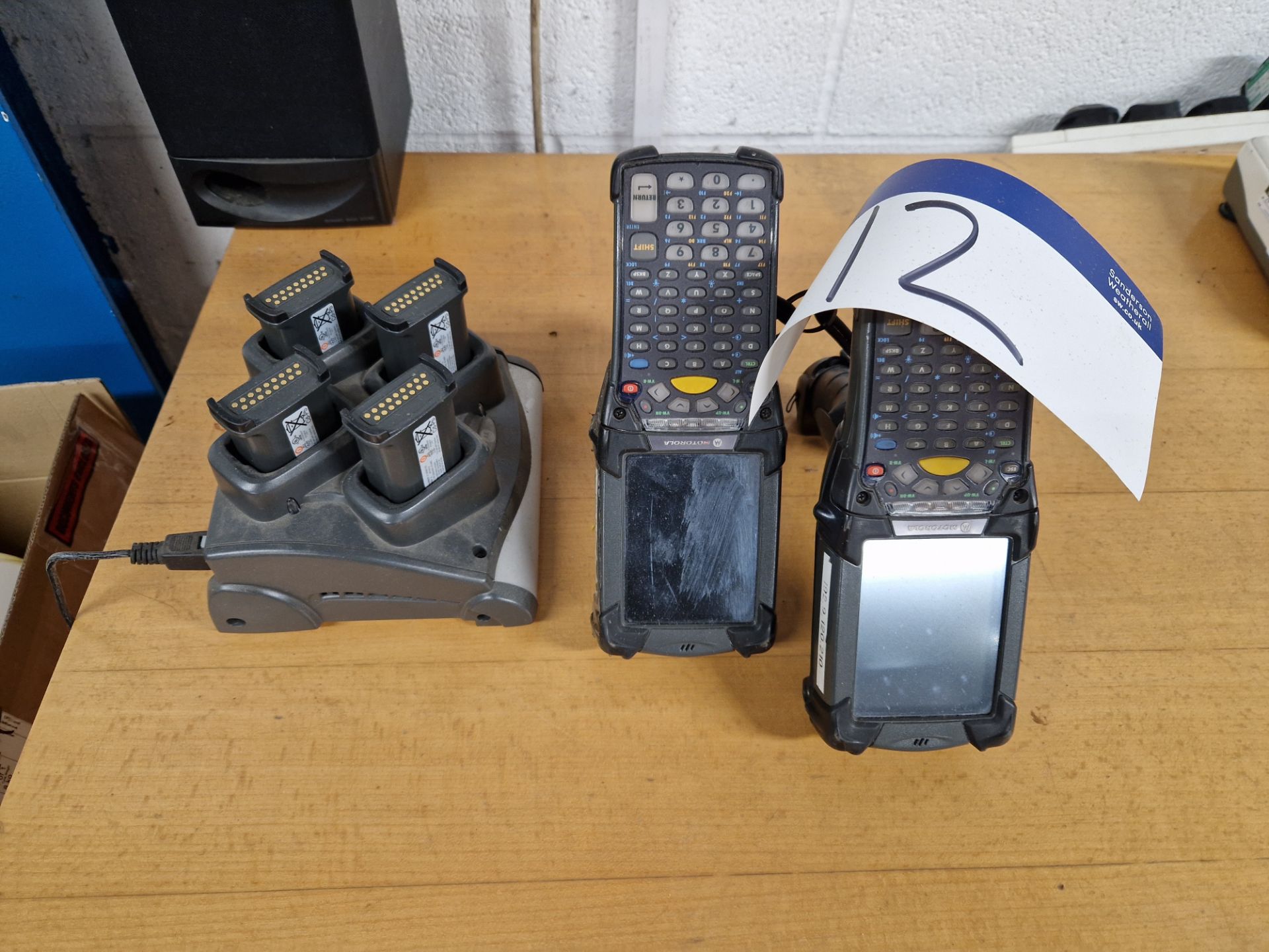 Two MOTOROLA MC9190 Hand Held Scanners with 4 station battery charger an batteries Please read the