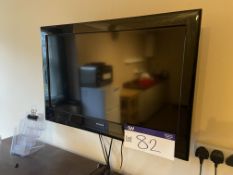 Polaroid Wall Mounted Flat Screen Television (with remote control) Please read the following