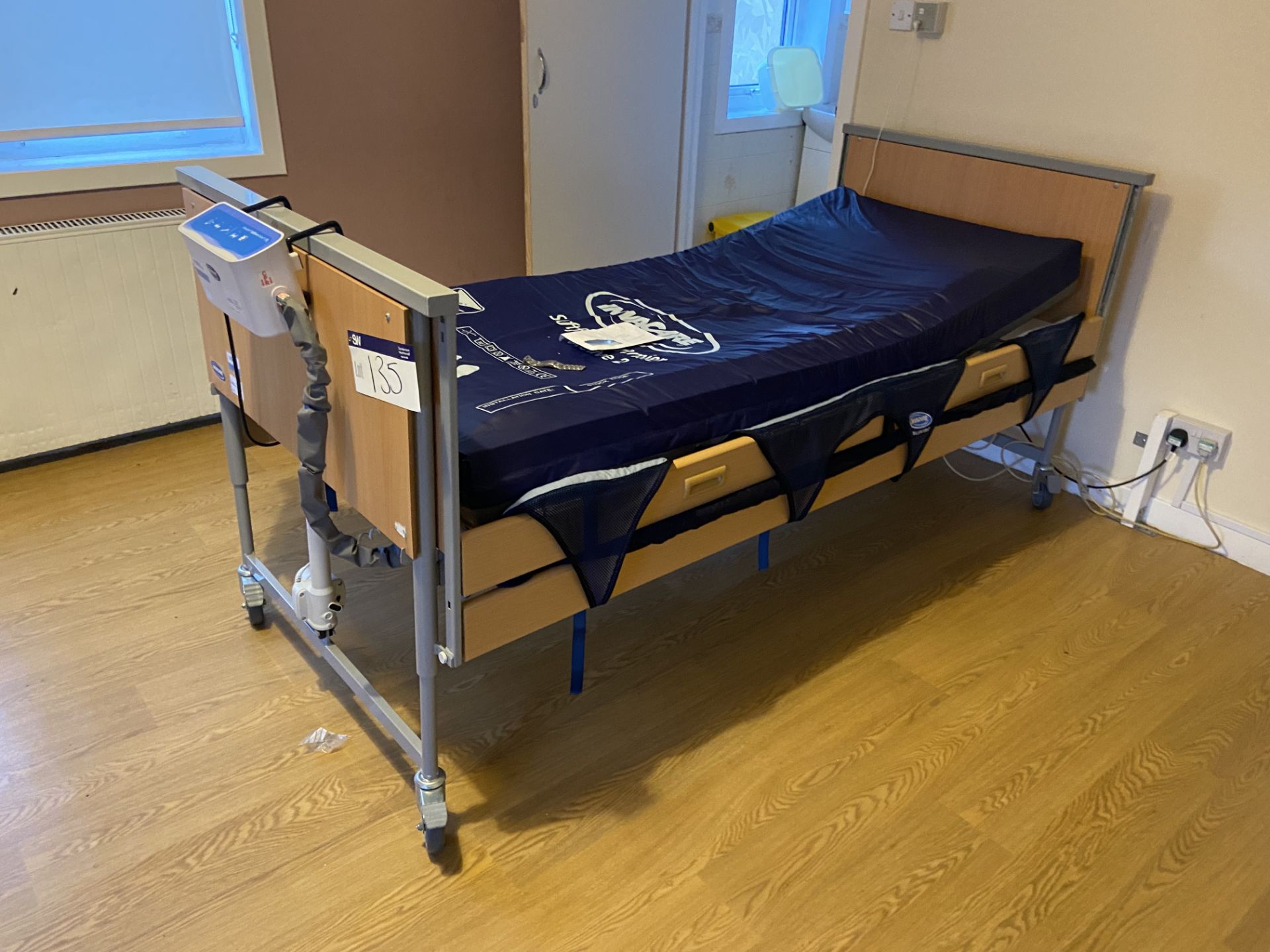 Invacare Mobile Adjustable Height Bed Frame, with Invacare soft foam premier mattress and Invacare