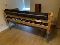 Invacare Mobile Adjustable Height Bed Frame, with Invacare mattress (Unnumbered Room) Please read