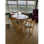 Two Oak Laminated Circular Tables, with five timber framed armchairs Please read the following