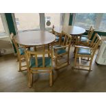 Two Oak Laminated Circular Tables, with six timber framed armchairs Please read the following