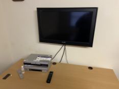 Sony Bravia Wall Mounted Flat Screen Television, with Pacific DVD player and LG VHS player (with