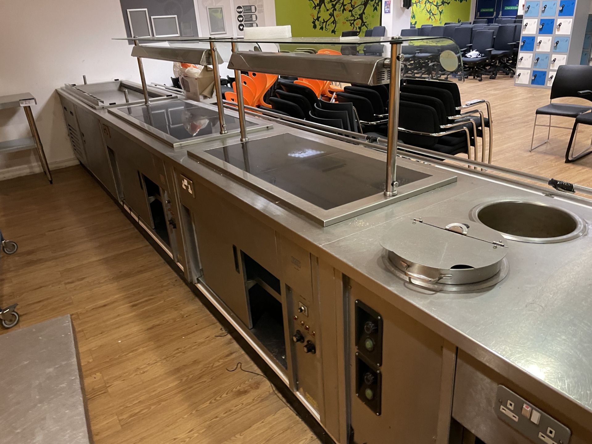STAINLESS STEEL FOUR SECTION SERVERY, approx. 7.2m long, with hot cupboard, hot plate and heat - Image 3 of 7