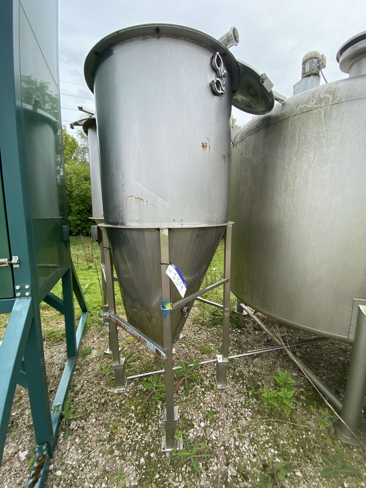 Stainless Steel Tank/ Hopper, approx. 2.5m x 1m dia., on stainless steel fabricated legs. lot
