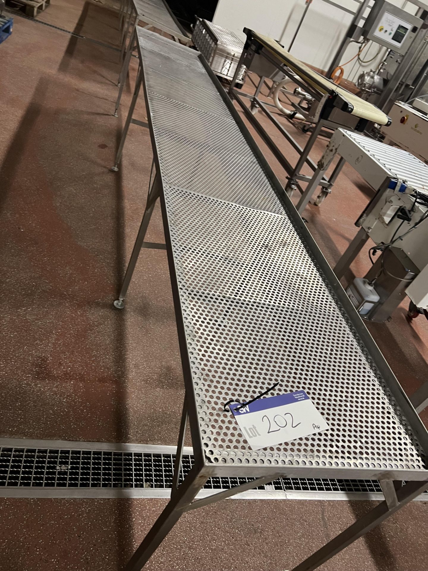 Perforated Bench /Table, approx. 3.5m x 0.55m x 0.7m high, , lift out charge - £30 + VAT, lot