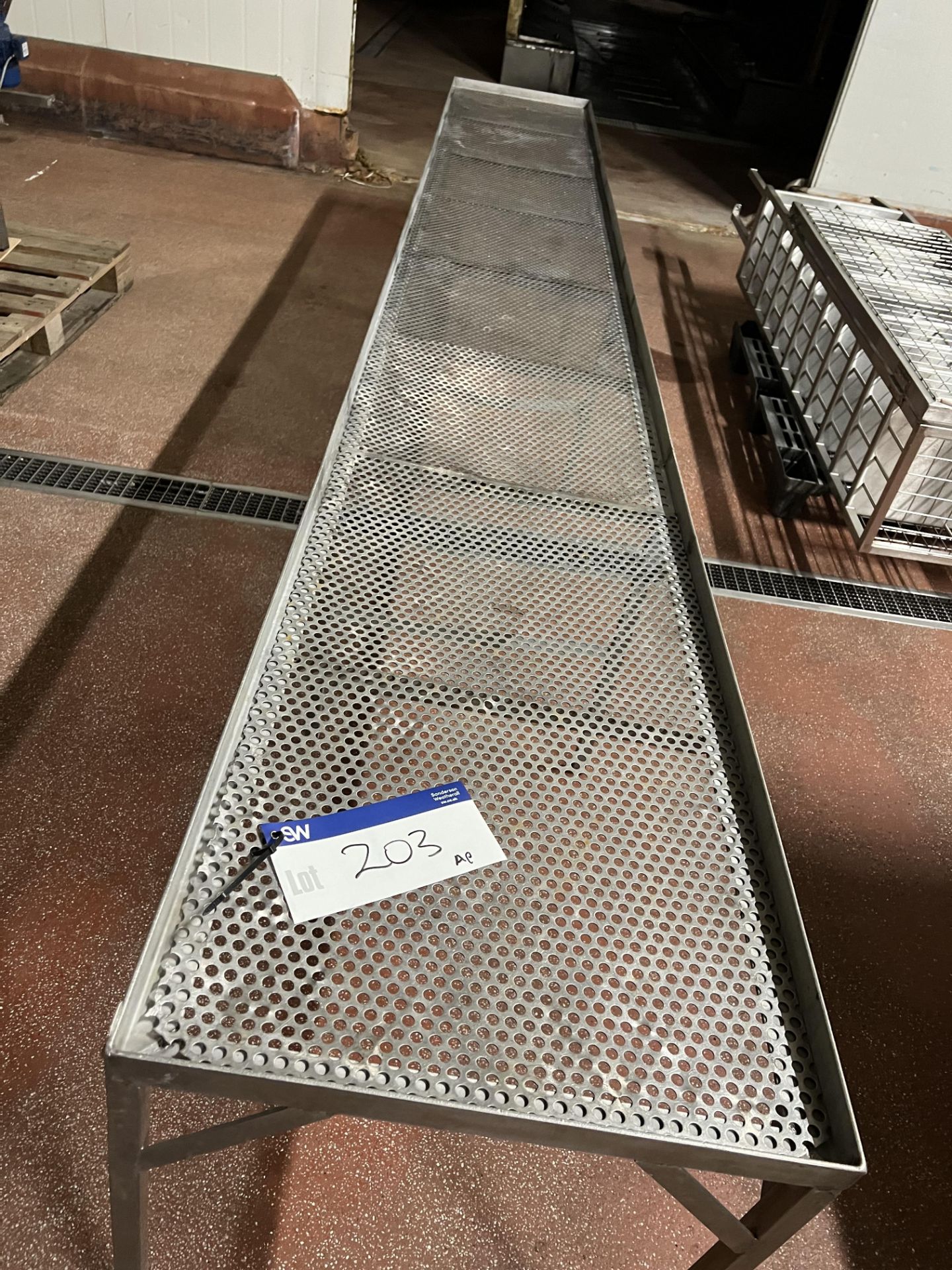 Perforated Bench /Table, approx. 3.5m x 0.55m x 0.7m high, lift out charge - £30 + VAT, lot