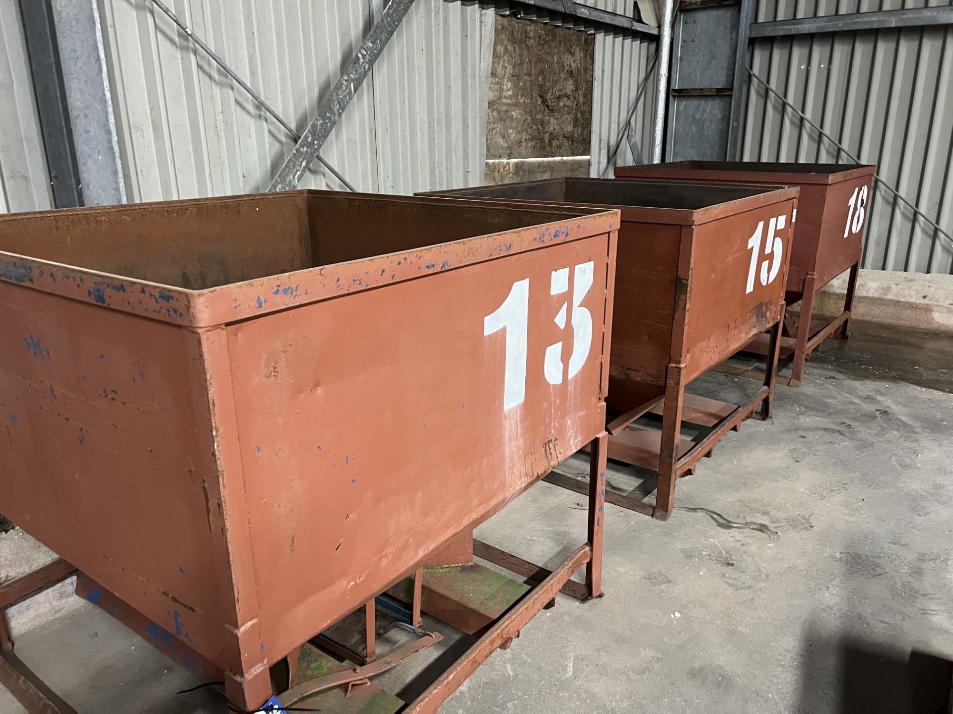 Three Steel Sitillages, with fluted bottoms and pallet guides, approx. 1.25m x 1.25m x 1.2m high,