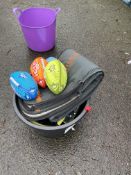 Assorted Beach Accessories, including rugby balls, bags and rope, as set out in plastic tub Please
