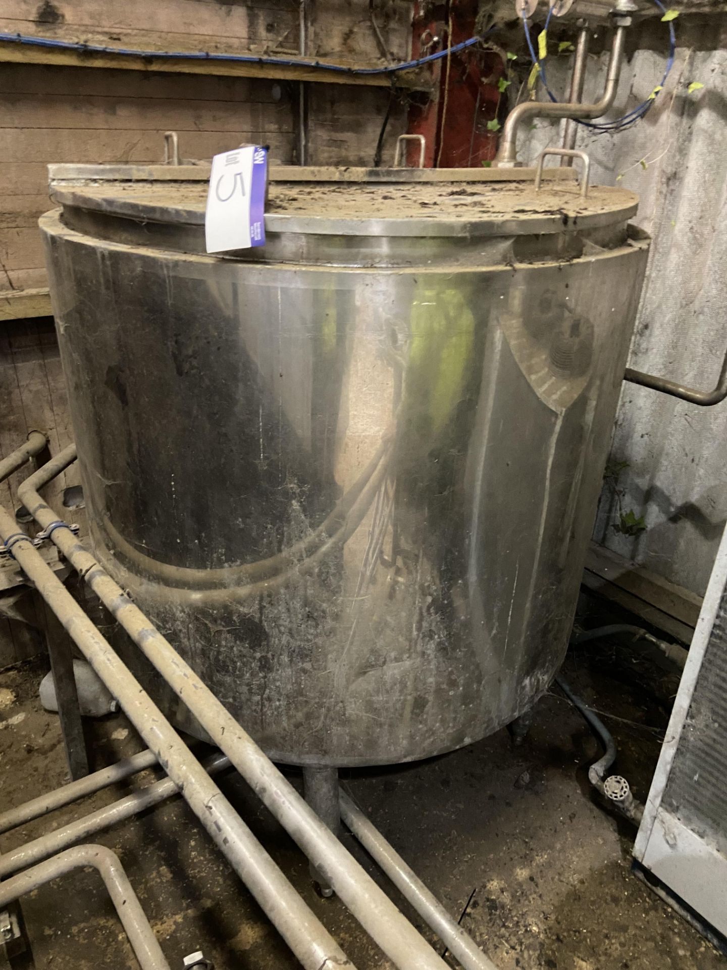 STAINLESS STEEL TANK, approx. 1.4m dia. x 1.2m deep, with insulated jacket, with two valves (
