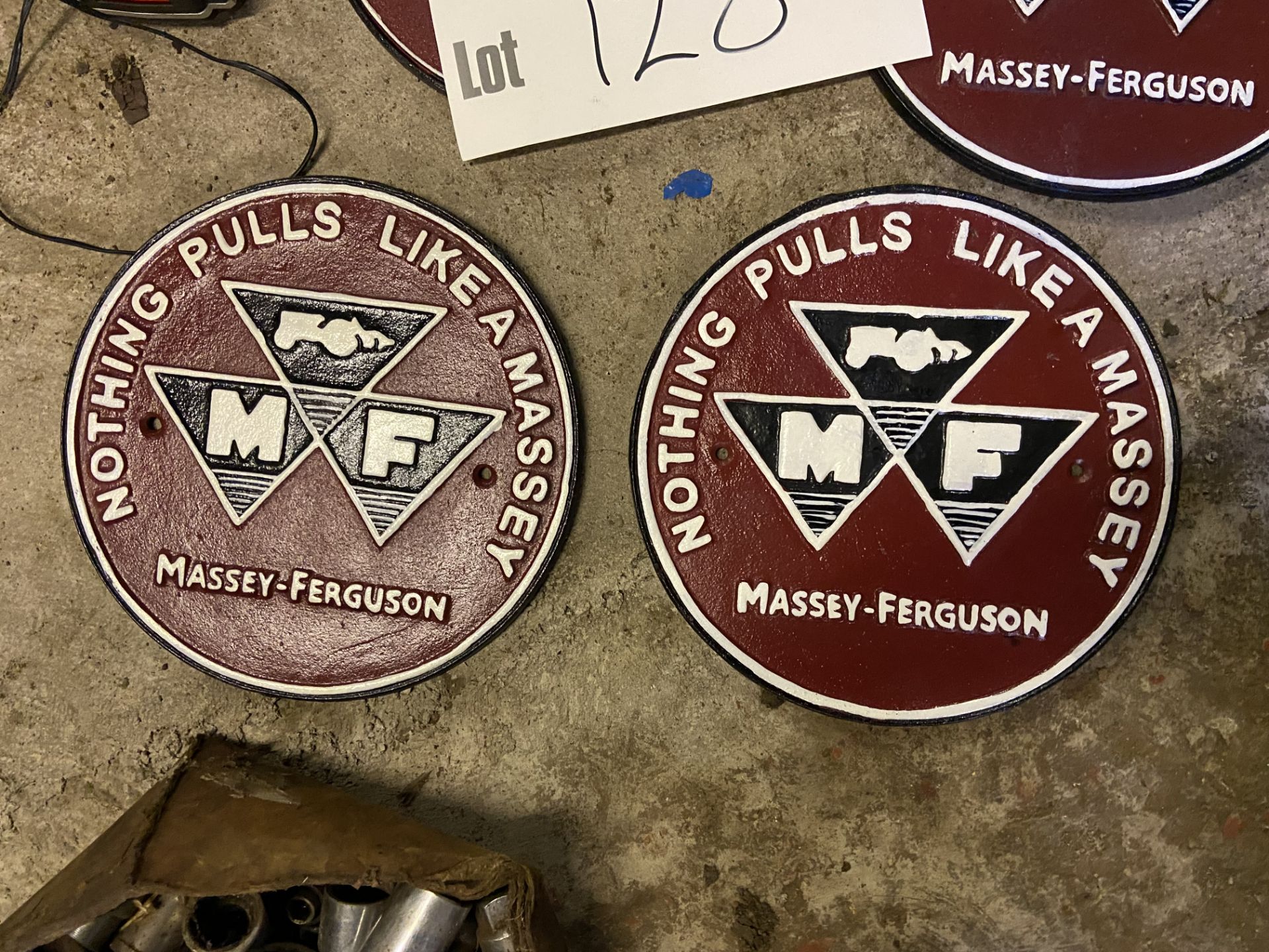 Two Massey-Ferguson Nothing Pulls Like a Massey Metal Signs Please read the following important