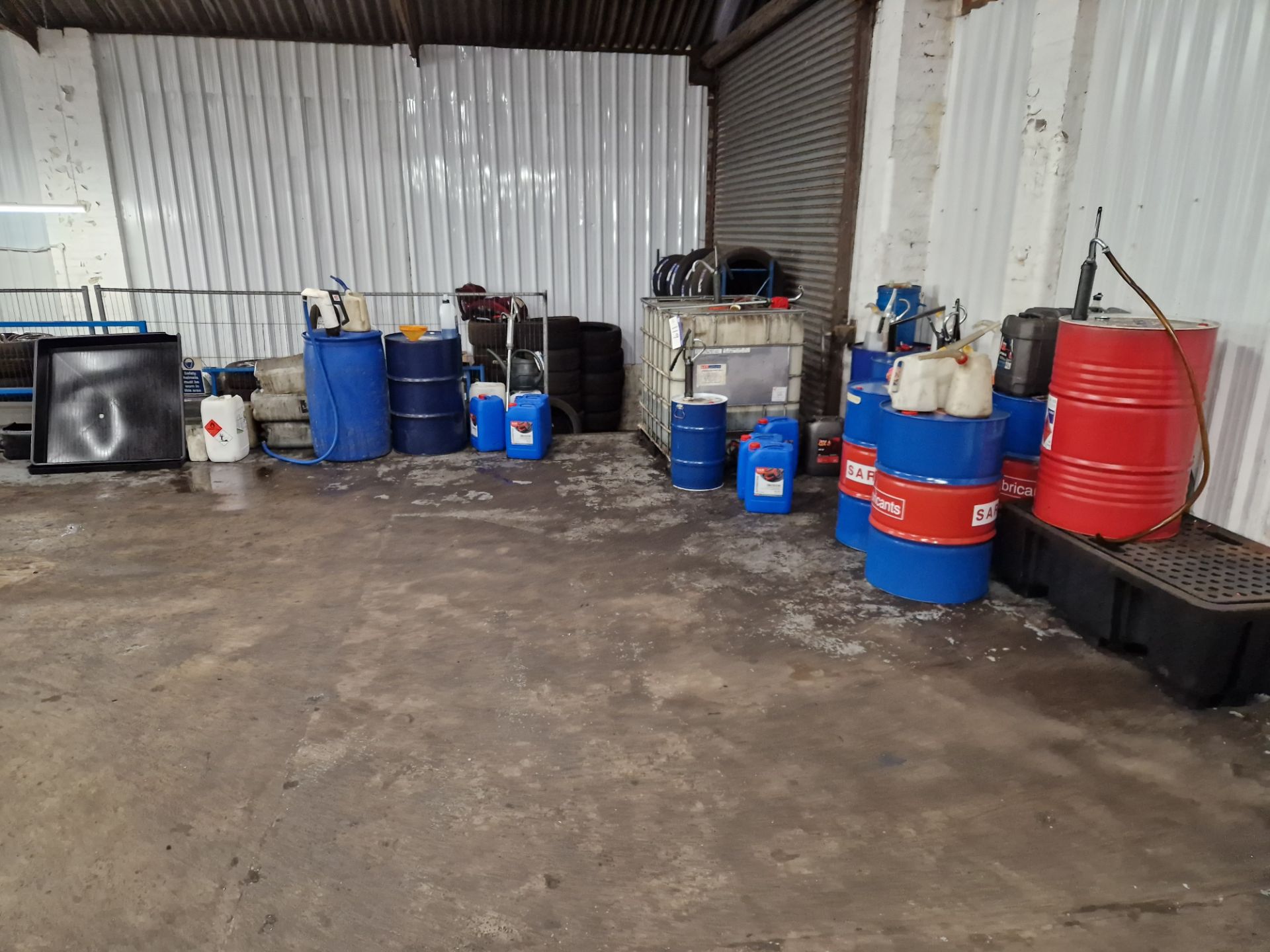 Nine Barrels, One IBC and Six Tubs of Various Hydraulic Oil, Engine Oil, Lubricants, etc with Bunded