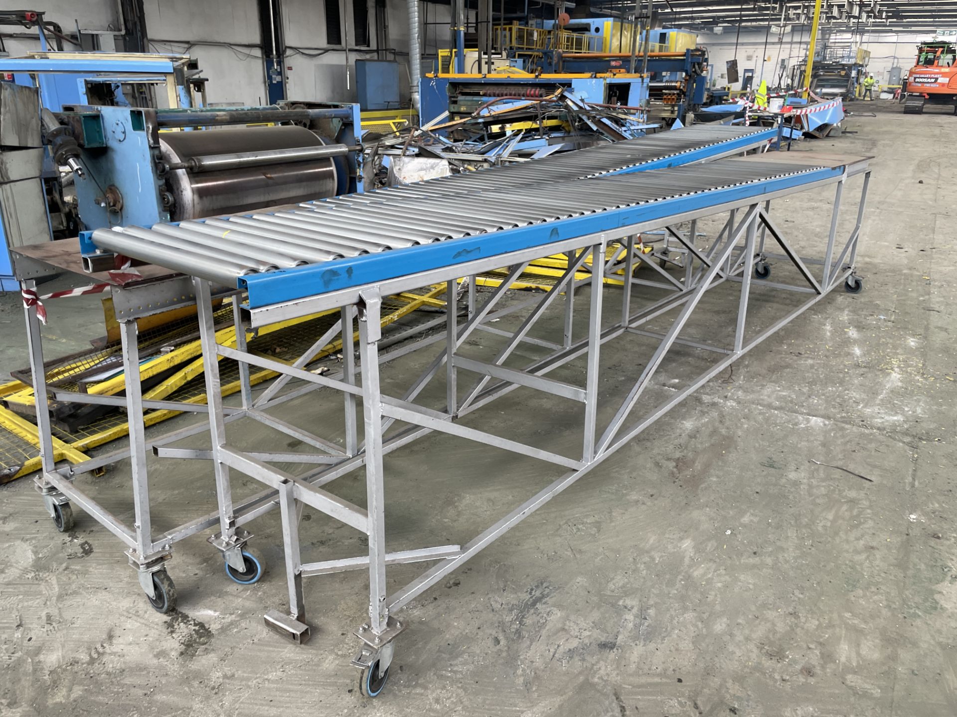 Mobile Gravity Roller Conveyor Table, approx. 6.5m long x 600mm wide on rolls (Contractors take