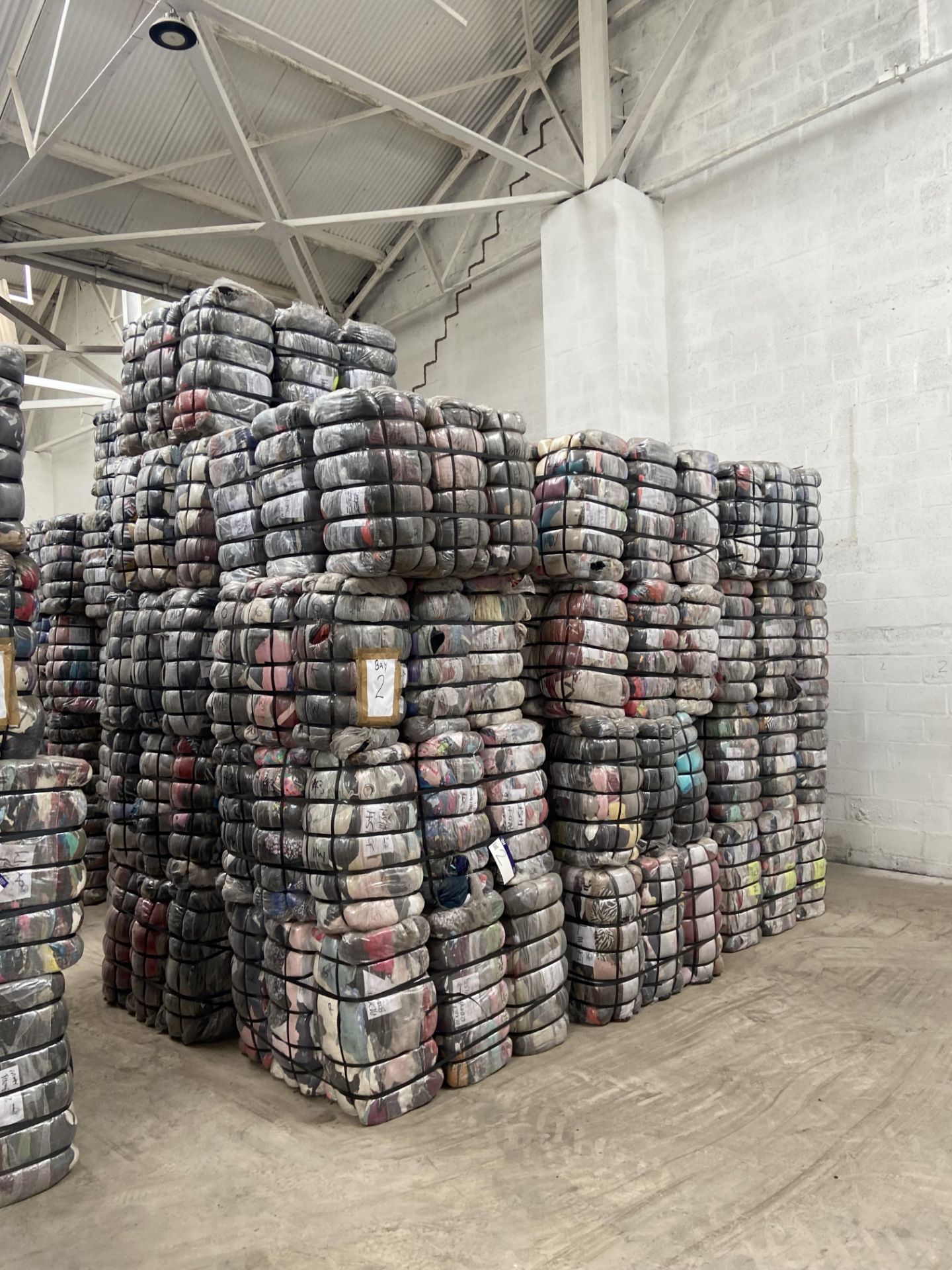 APPROX 217 BALES (9765KG) RECYCLABLE WASTE TEXTILES, understood to comprise: Four bales x 45kg Adult