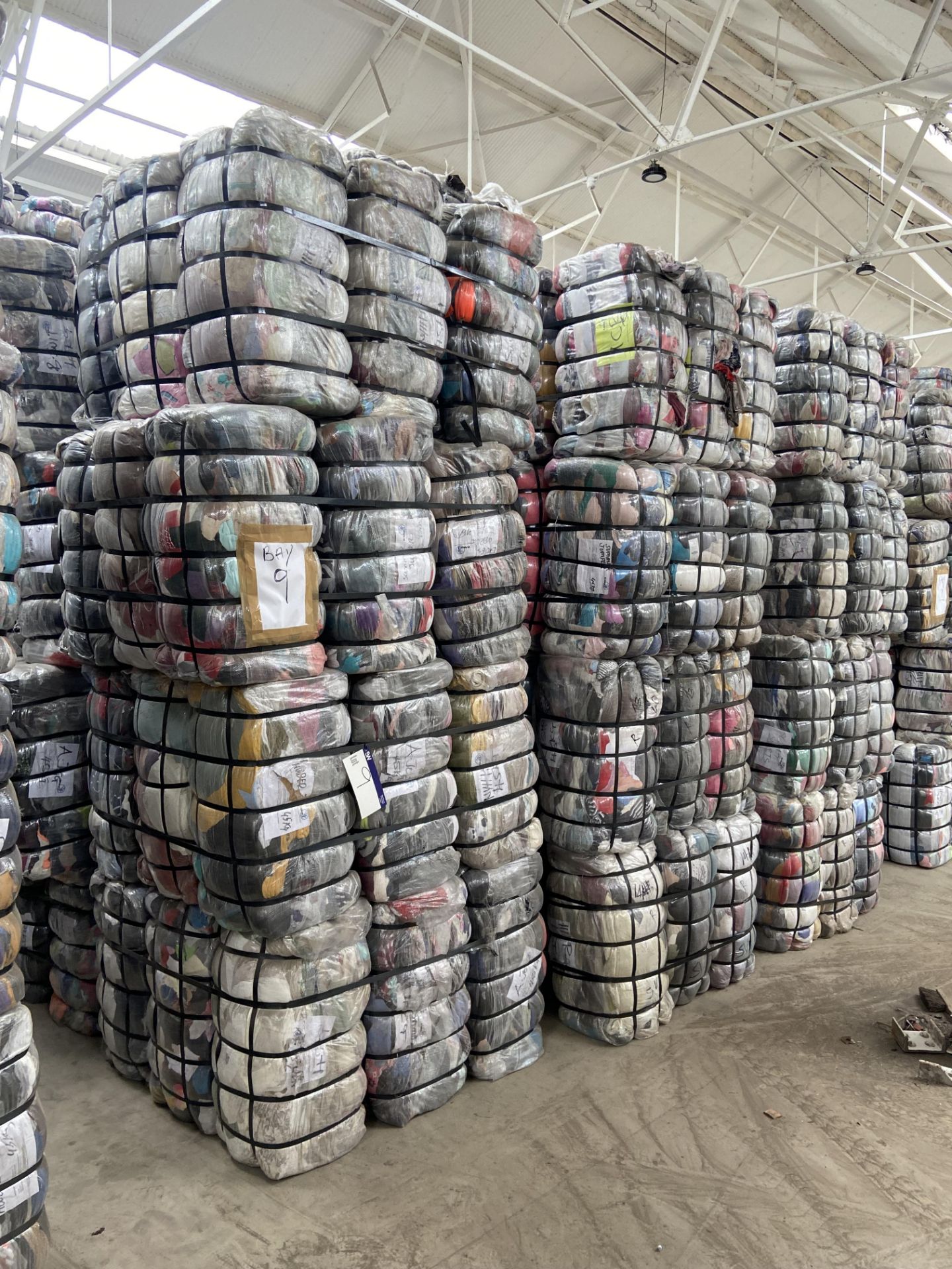 APPROX 214 BALES (9630KG) RECYCLABLE WASTE TEXTILES, Understood to comprise: 10 bales x 45kg Adult