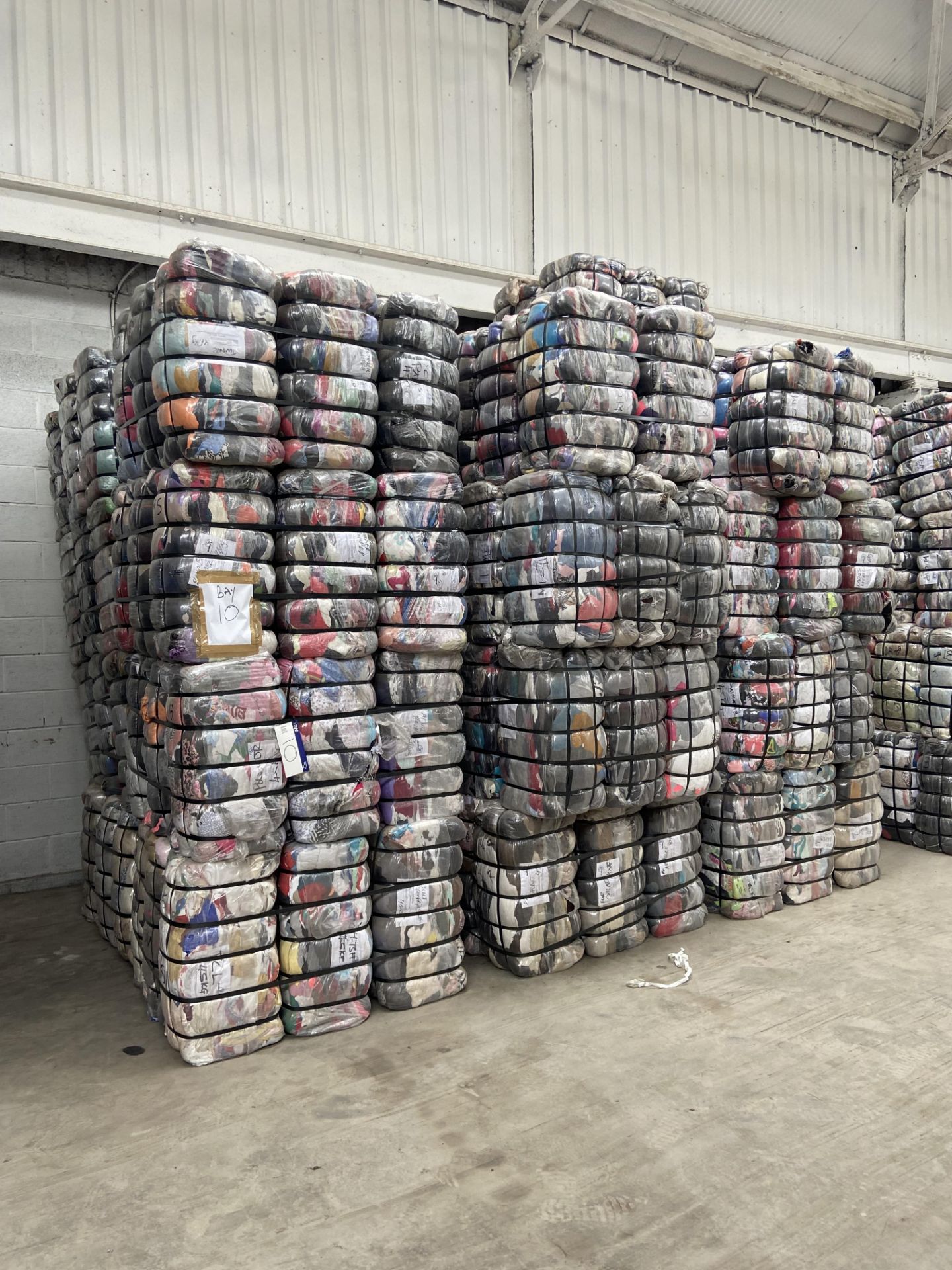 APPROX 200 BALES (9000KG) RECYCLABLE WASTE TEXTILES, Understood to comprise: Three bales x 45kg