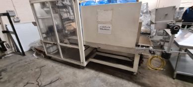 EuroPack Wrapper, with fitted heat tunnel, serial number 00-10658, year of manufacture 2000, machine