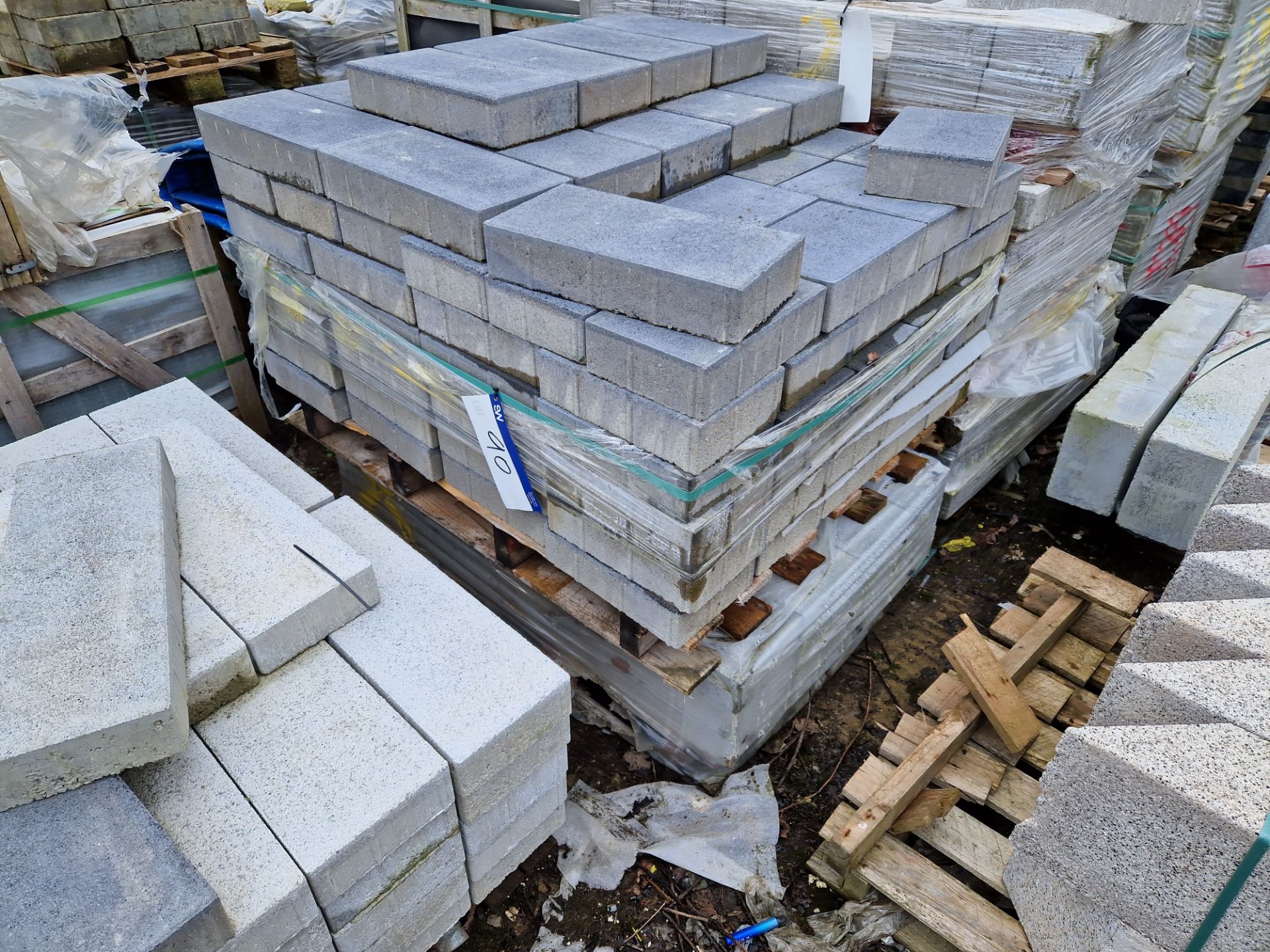 Two Pallets of Paving Slabs, Approx. 300x200x80mm Please read the following important notes:- ***