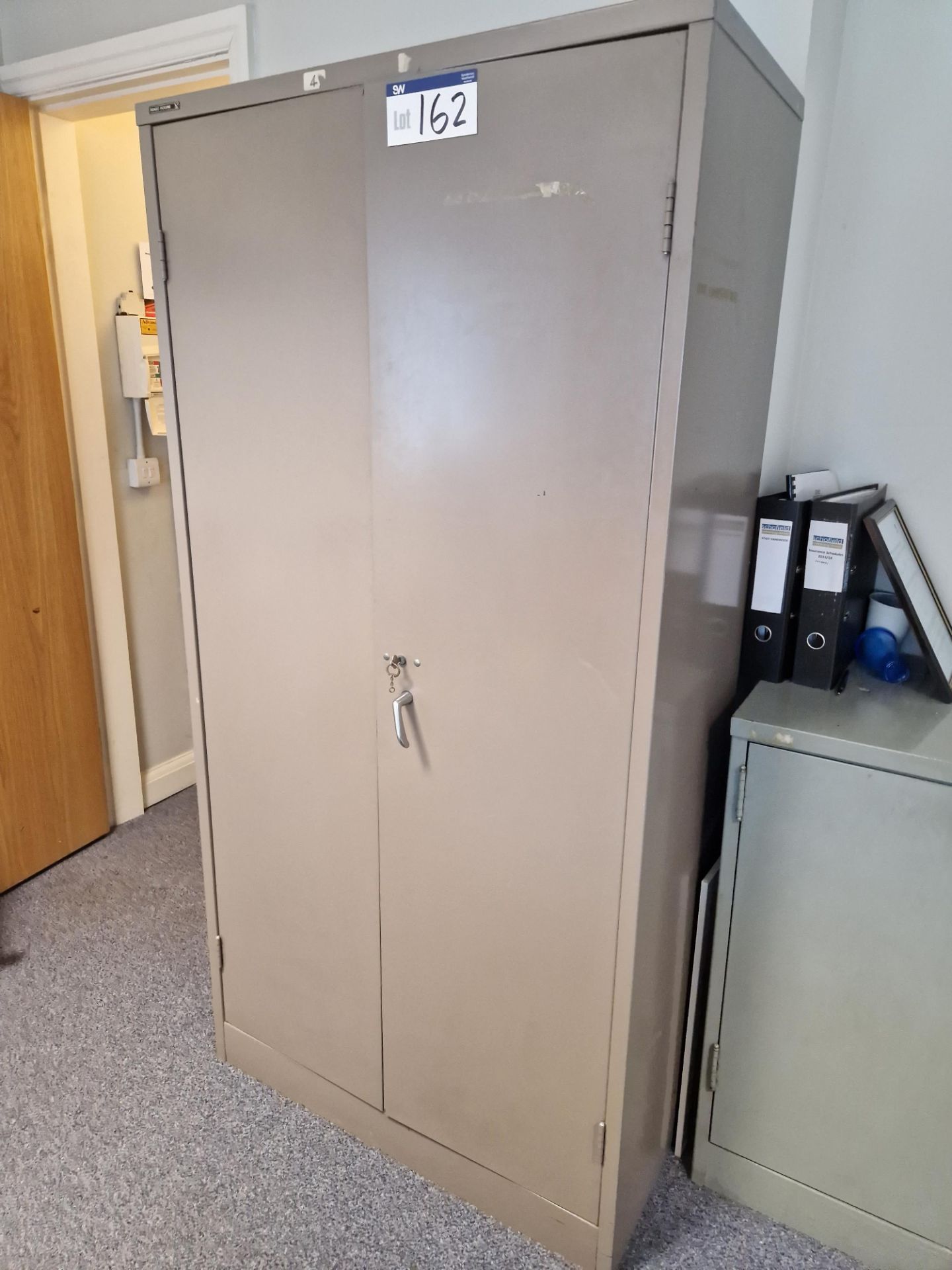 Double Door Metal Cabinet Including Stationary Contents Please read the following important