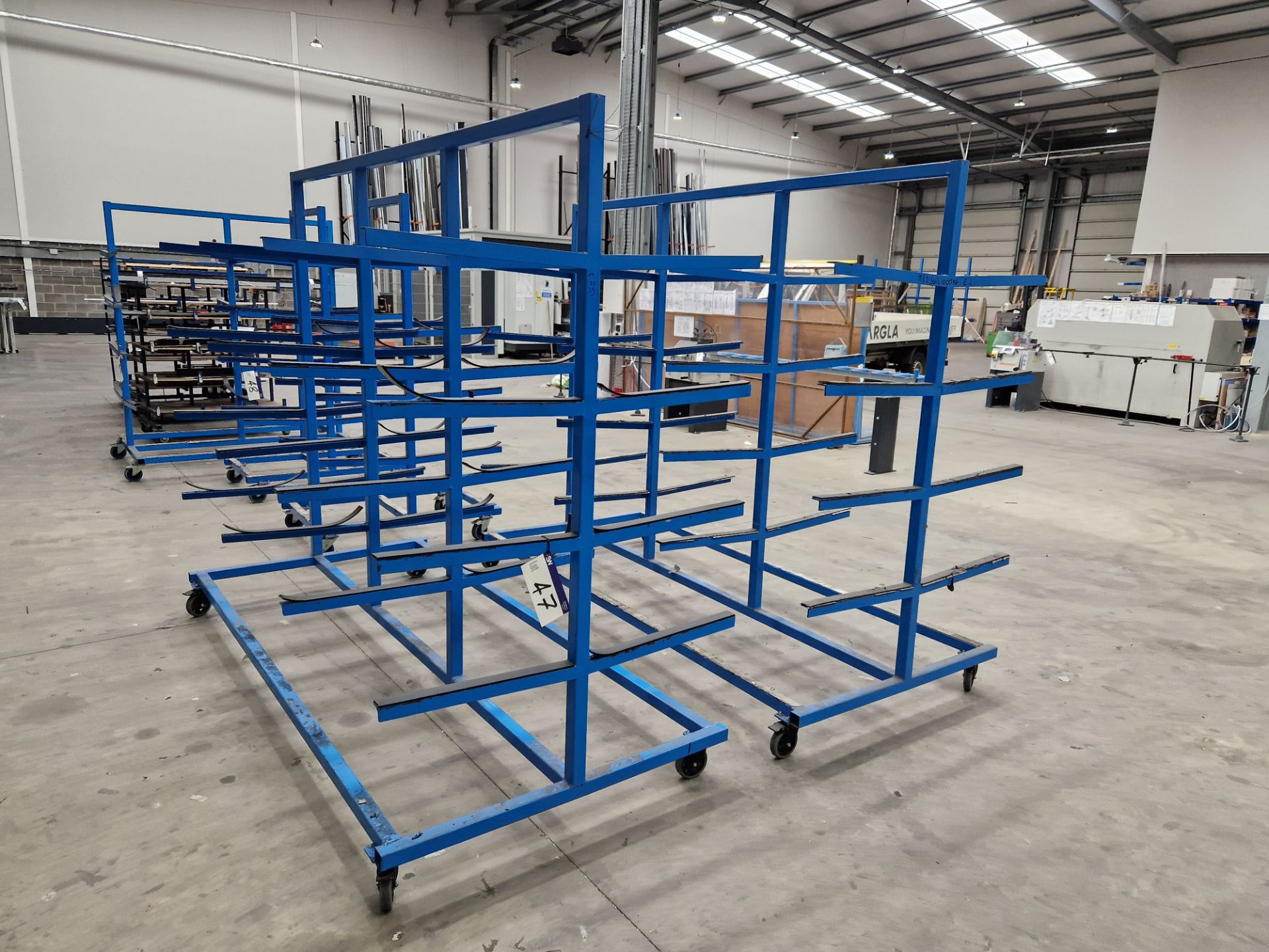 Two 4 Tier Double Sided Mobile Profile/Stock Racks, Approx. 2.8m x 1.2m x 2.2m Please read the