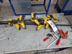 Four Stanley Trigger Clamps and Three Various Clamps Please read the following important