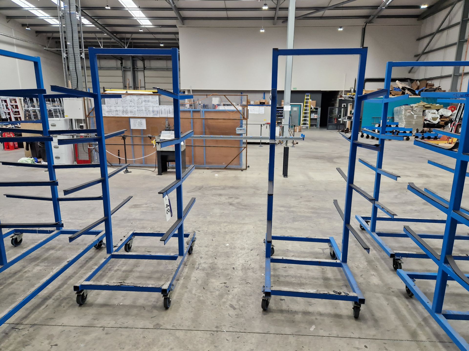 Two 4 Tier Double Sided Mobile Profile/Stock Racks, Approx. 1.3m x 0.8m x 2.2m Please read the