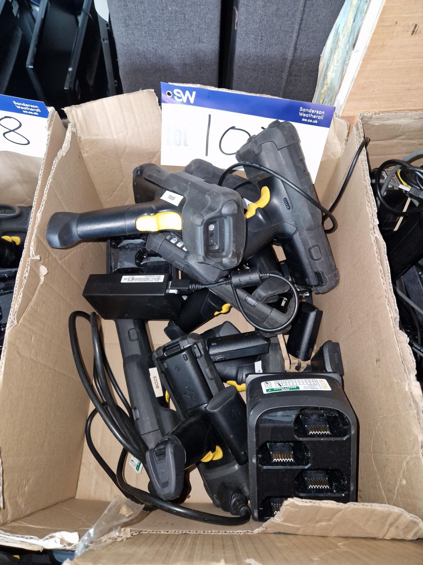 Seven Zebra MC330X Scanners with Chargers and Spare Batteries Please read the following important