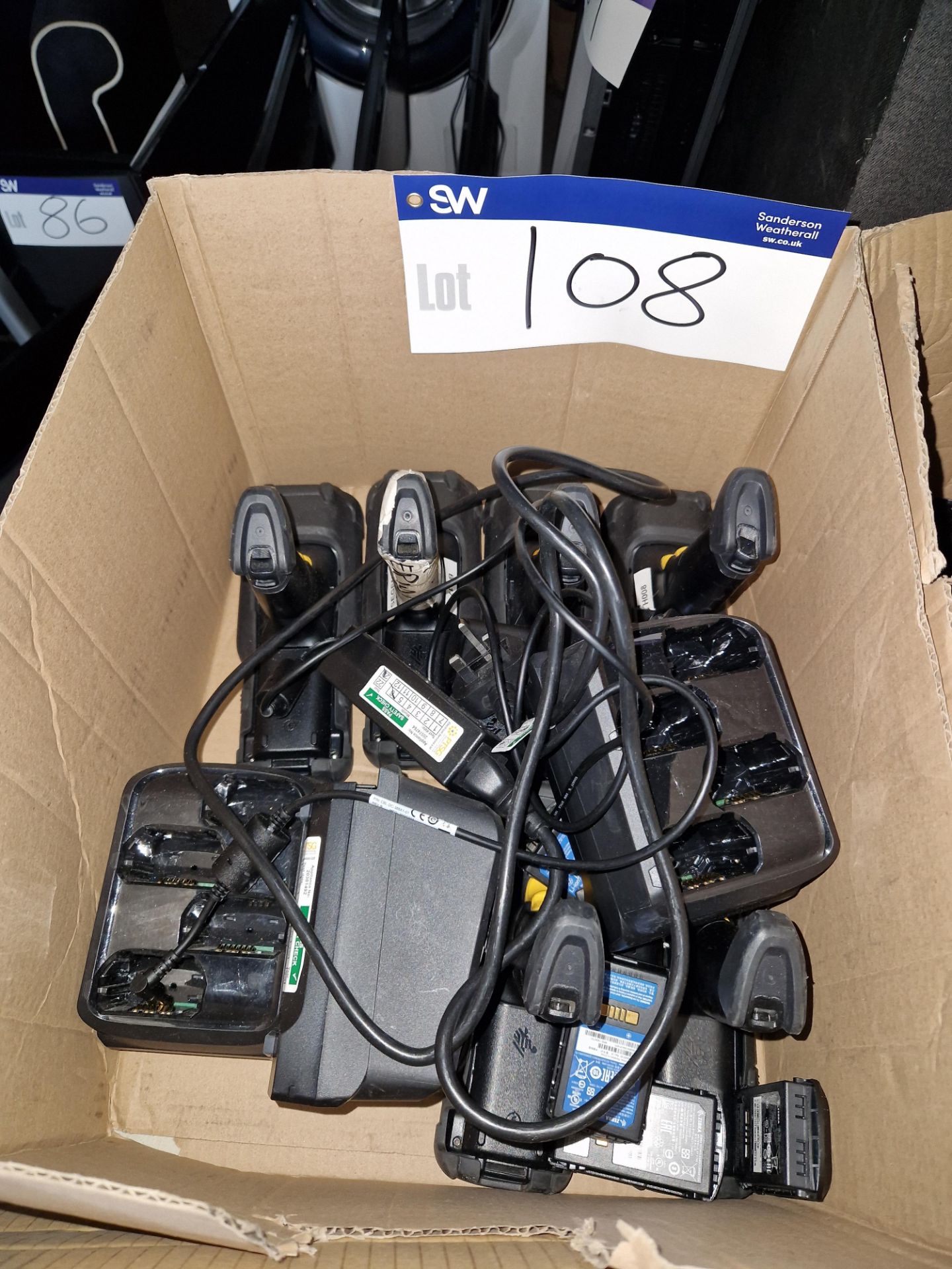 Six Zebra MC330X Scanners with Chargers and Spare Batteries Please read the following important