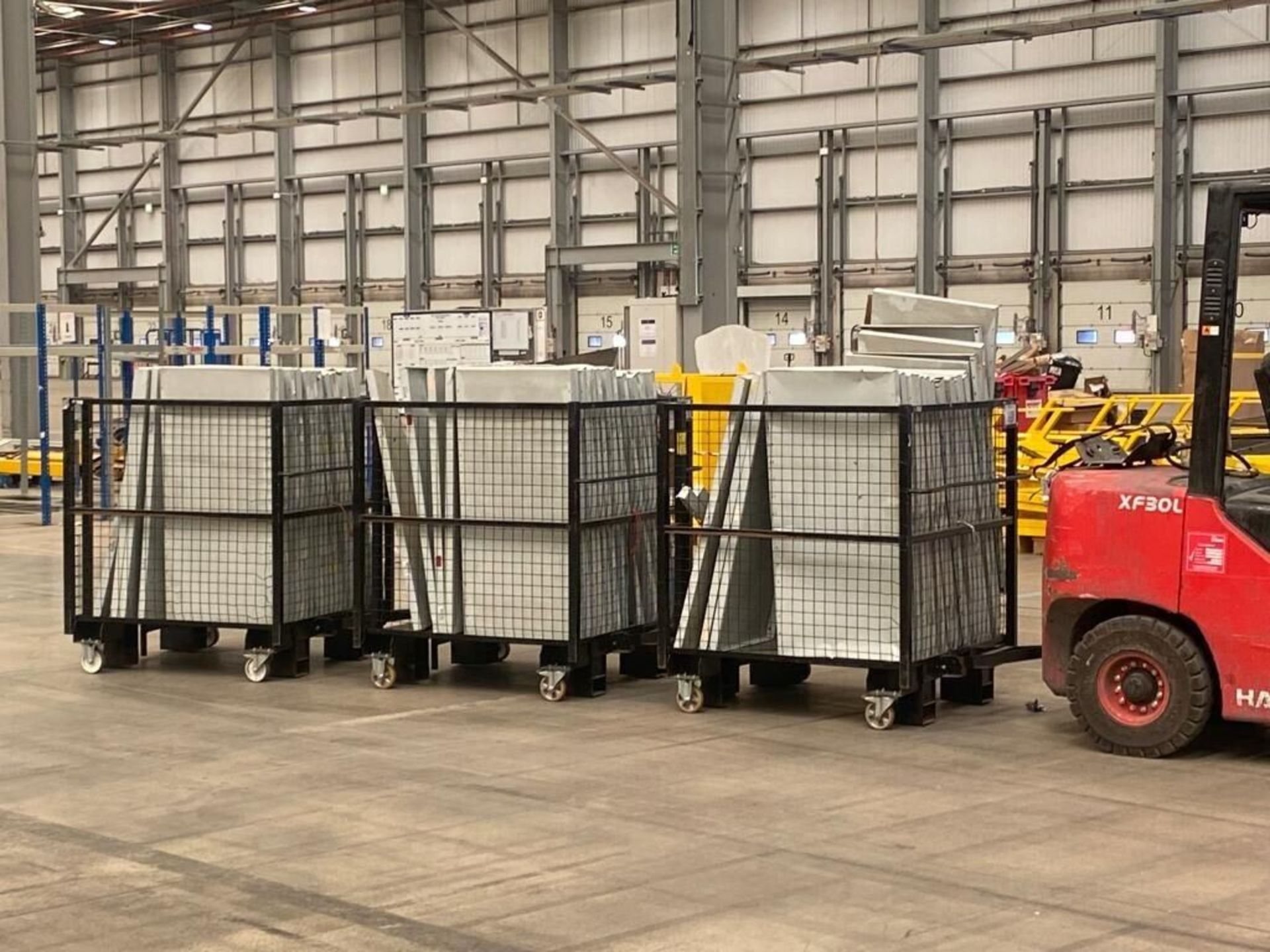 One Industrial Warehouse Black Picking Cage, with two swivelling wheels, brakes and two straight