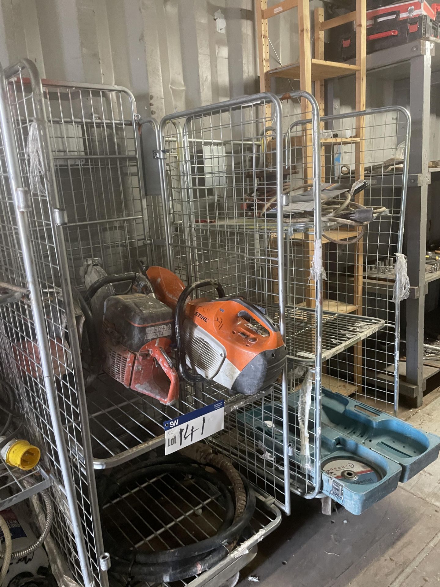 Two Collapsible Cages, with three Stihl saws Please read the following important notes:- ***Overseas