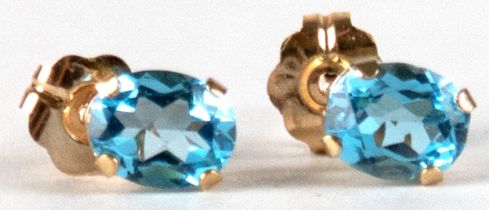 Ohrstecker, 10 kt. GG, Blautopase, Dm. 5x4 mm