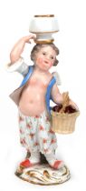 Meissen-Figur "Amorette mit Obstkorb", Schwertermarke 1850-1924, polychrom bemalt, mehrfach bestoße