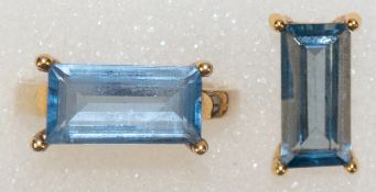 Ring und Anhänger, 333er GG, je mit hellblauem Stein im Baguetteschliff, RG 59, Anhänger 1,5x0,7 cm