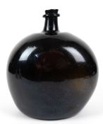 Flasche, dunkelbraunes Waldglas, stark gebauchter, abgeflachter Korpus mit Abriss, H. 24 cm
