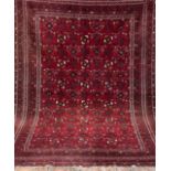 Afghan, Wolle auf Wolle, rotgrundig, Fransen fehlen teilweise, 152x220 cm