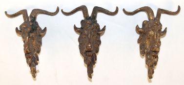 3 Bronze-Appliken "Steinbockkopf", 19. Jh., plastisch, 10 cm